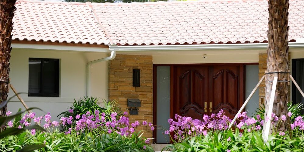 tile residential roof with beautiful gardens